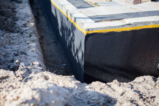 Professional Emergency Waterproofing technician working in Rogersville, AL